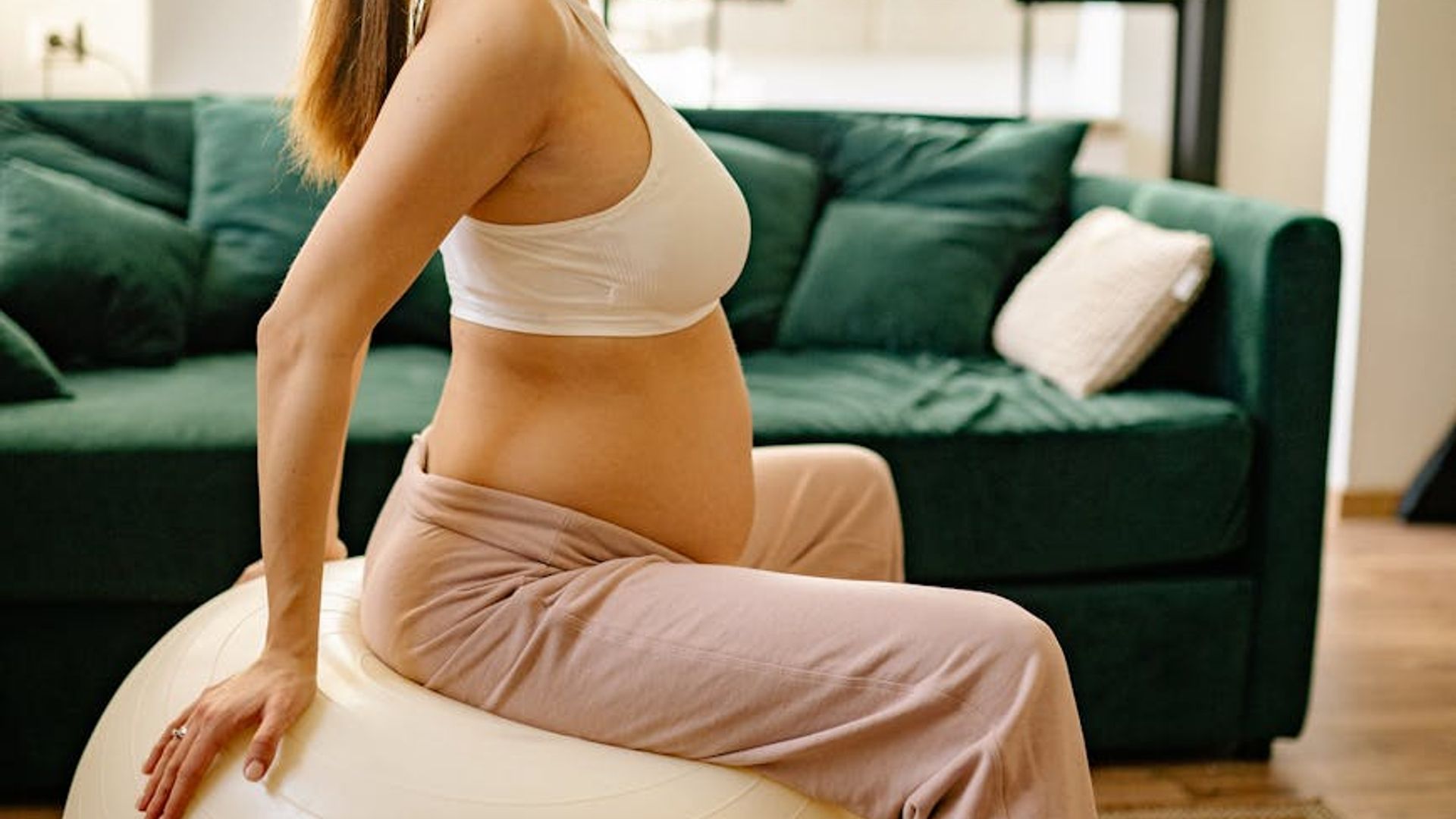 Calm and spacious room for yoga practice with soft lighting.